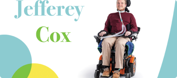 Full body image of Shepherd graduate, Jefferey Cox, in a sip-and-puff wheelchair.