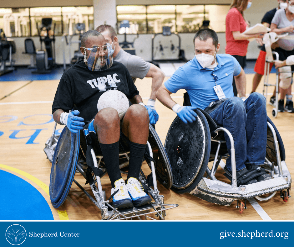 Shepherd patients playing quad rugby in gymnasium