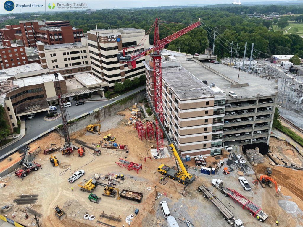 Aerial view of the tower crane at the future of home of the Marcus Center of Advanced Rehabilitation.